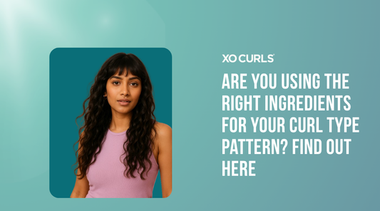 Woman with long, wavy curly hair and bangs wearing a lavender top against a deep teal background, featured in XO Curls’ blog titled “Are You Using the Right Ingredients for Your Curl Type Pattern? Find Out Here.”